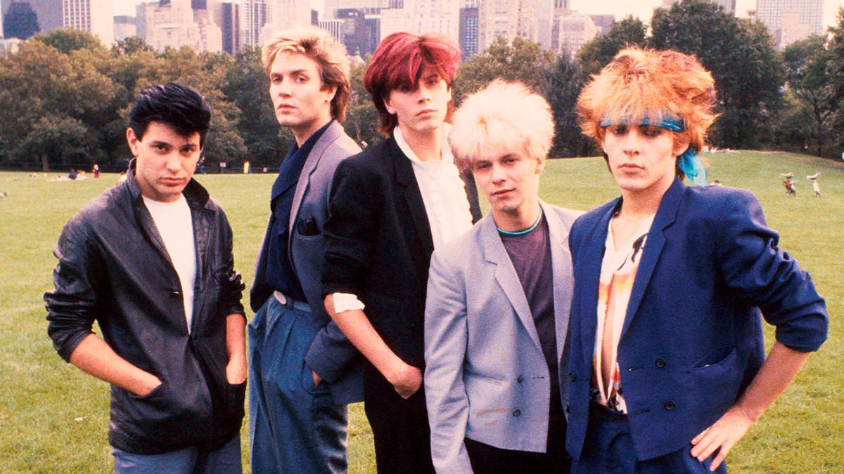 Members of Duran Duran pose for a photo