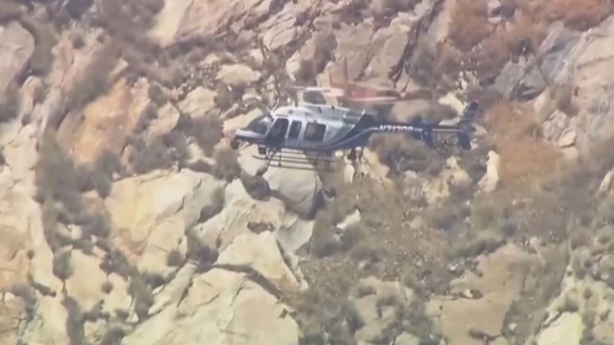 helicopter searching mountain