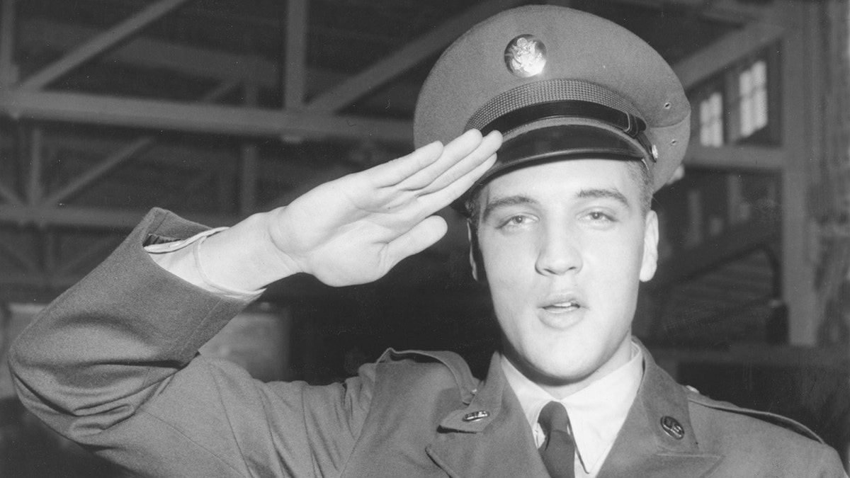 Elvis Presley pictured saluting the Army