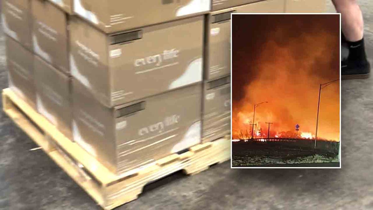 Picture of diapers on a crate prepared for shipping with an inset of a picture of the wildfire