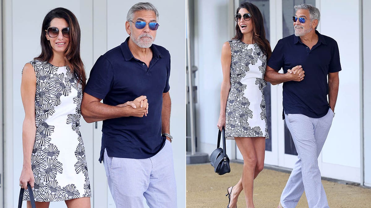 george clooney amal clooney holding hands and walking in venice