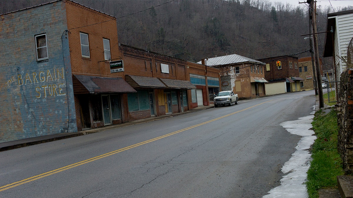 buildings in a poor west virginia townshowing greater appalachia's economic decline