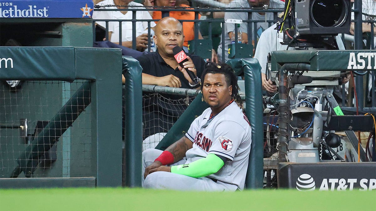 Jose Ramirez watches from the dugout
