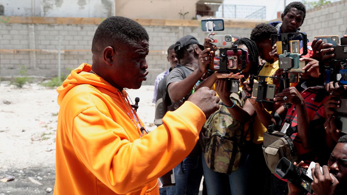 Prominent gang leader Jimmy Cherizier speaks to journalists in Port-au-Prince, Haiti, on Aug. 16, 2023. 