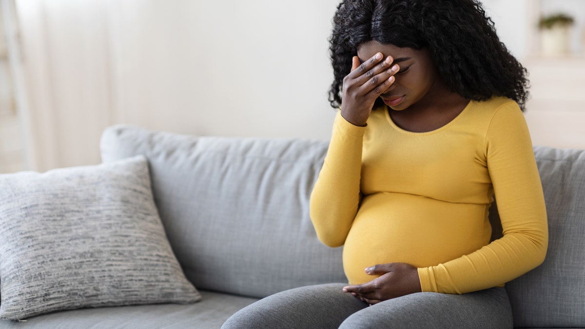 Pregnant woman suffering