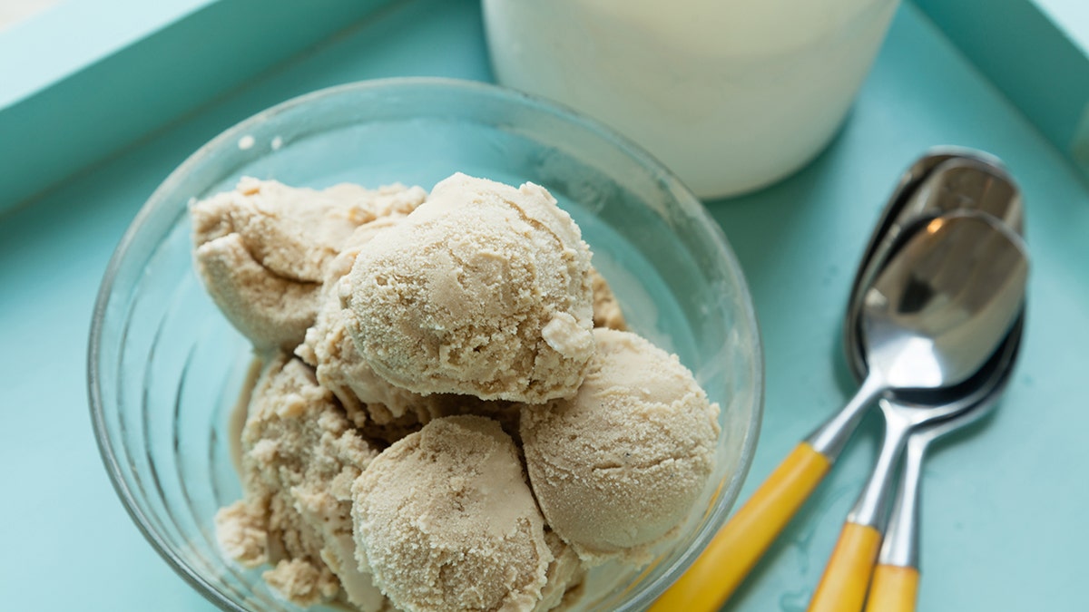 Vanilla ice cream with spoons