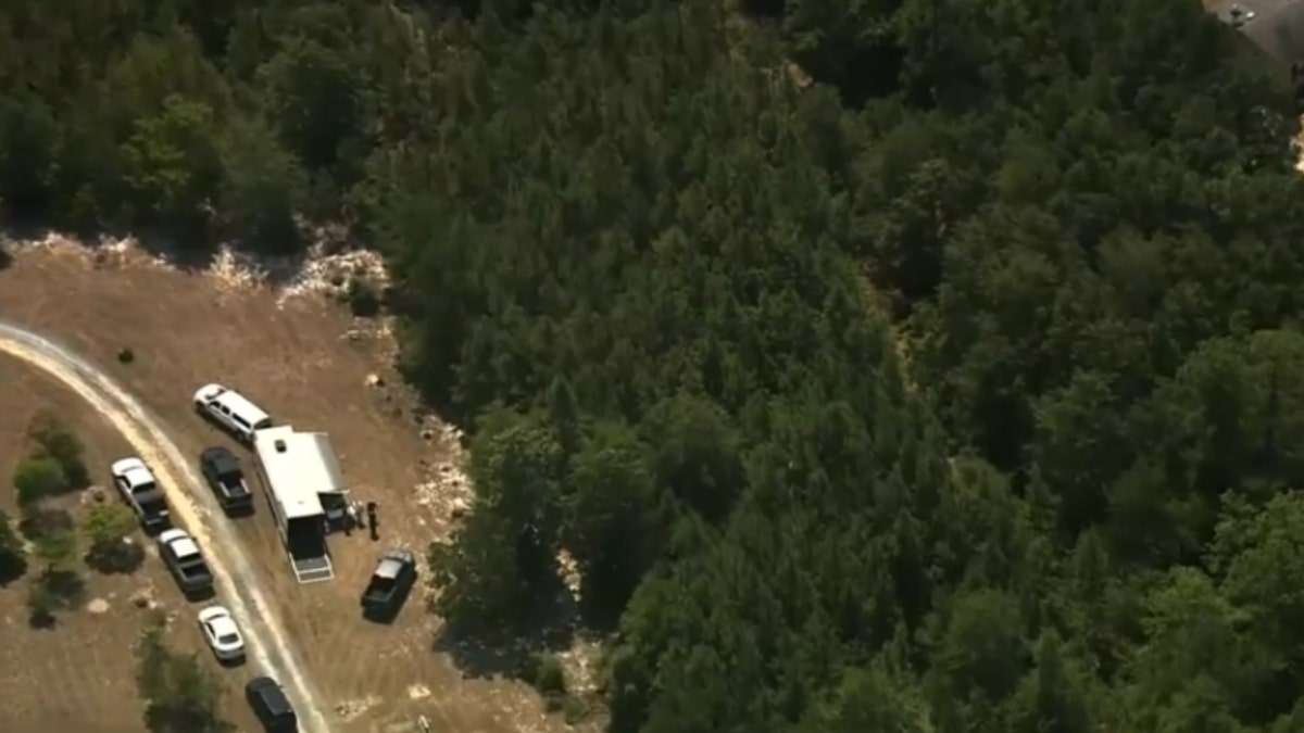 Drone footage shows the area above Cemetery Road in Montgomery County where police set up search tents