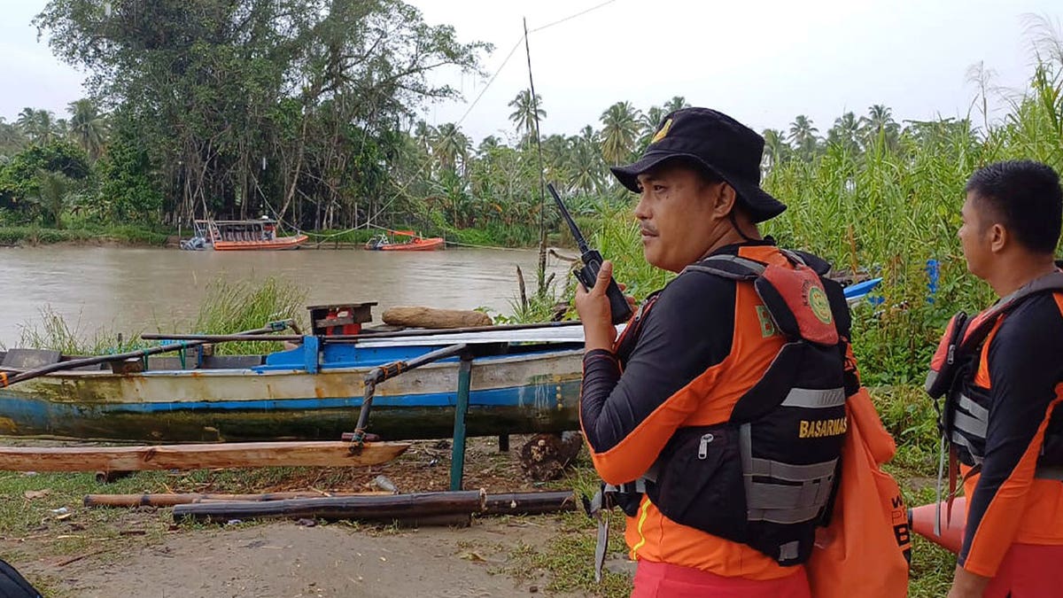 rescuers search in Indonesia