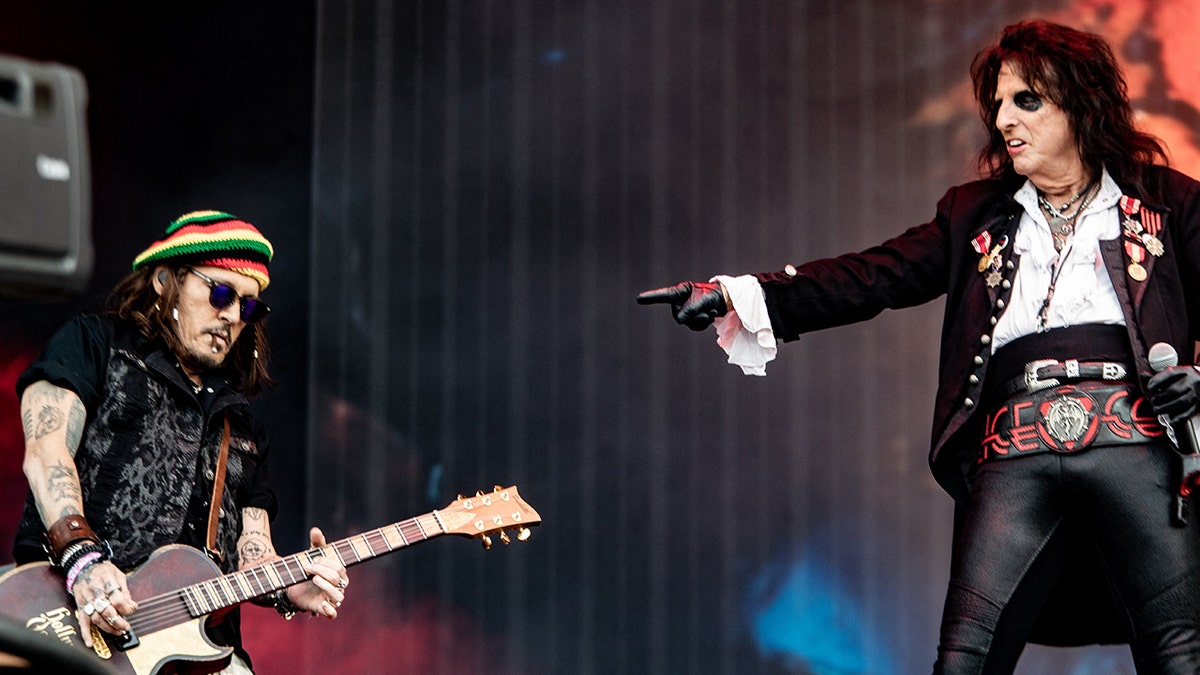 Alice Cooper playing with Johnny Depp