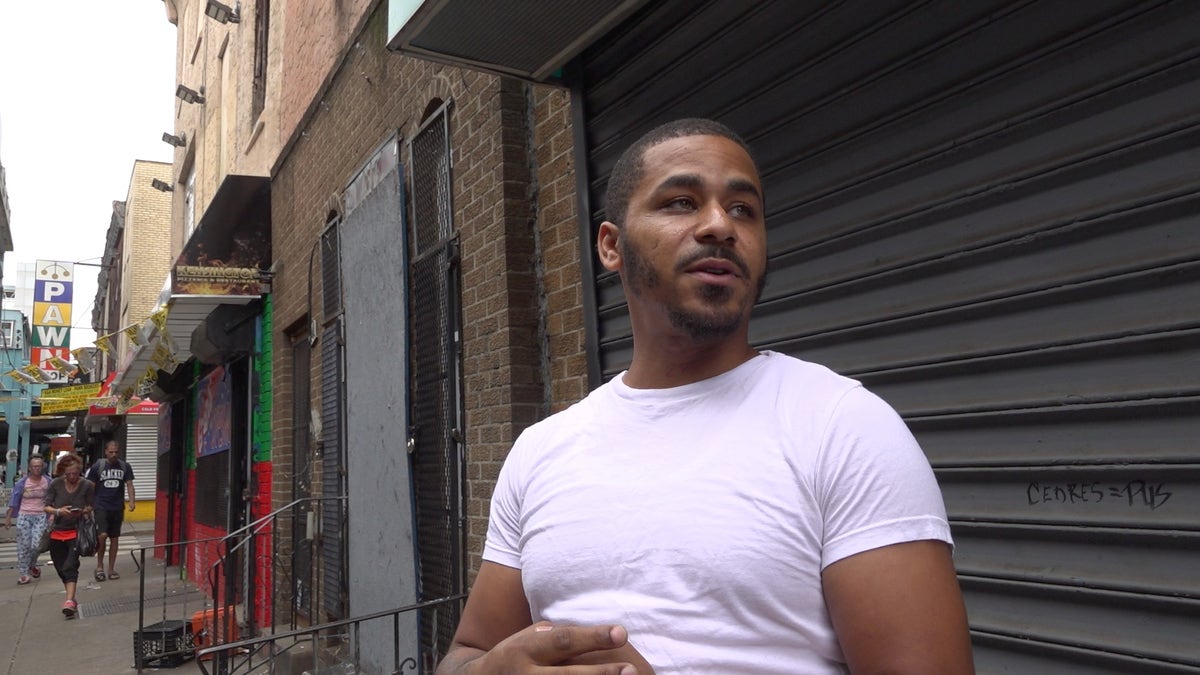 A Kensington resident looks at his Philadelphia neighborhood