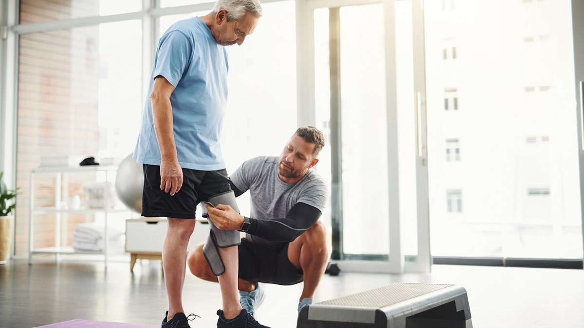 Man with knee brace