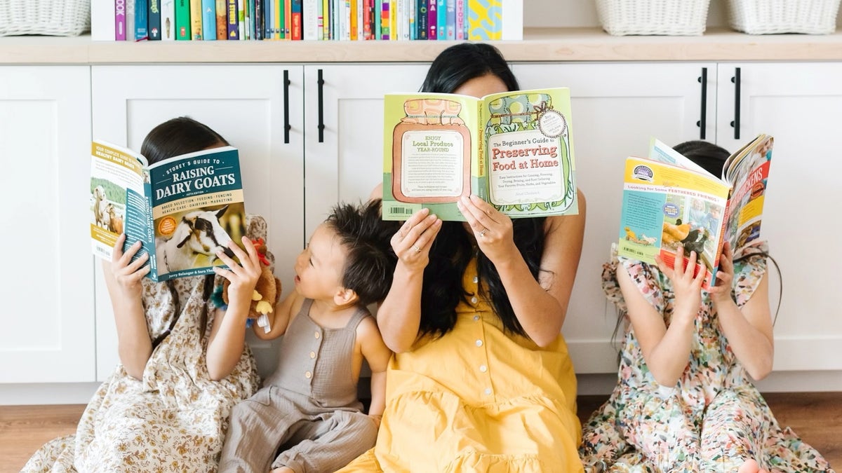 An Oregon homeschool family holding books