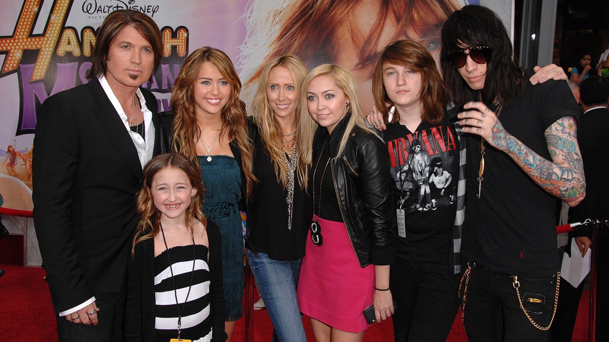 Billy Ray and 5 of his 6 children on the red carpet for the "Hannah Montana" movie premiere