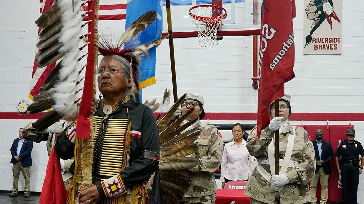 Native man leads school ceremony