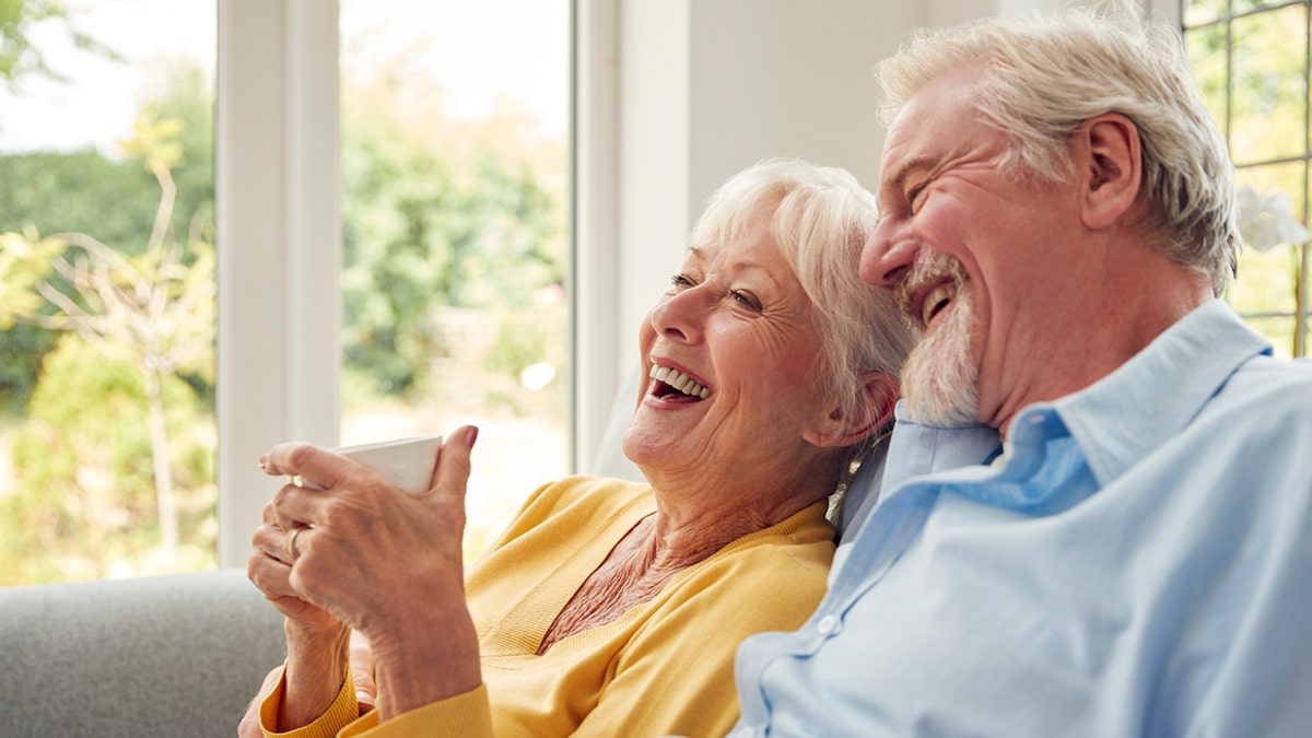 Older couple laughing