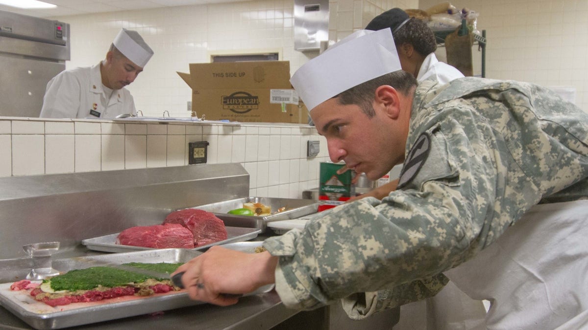 Cook in Army dining facility