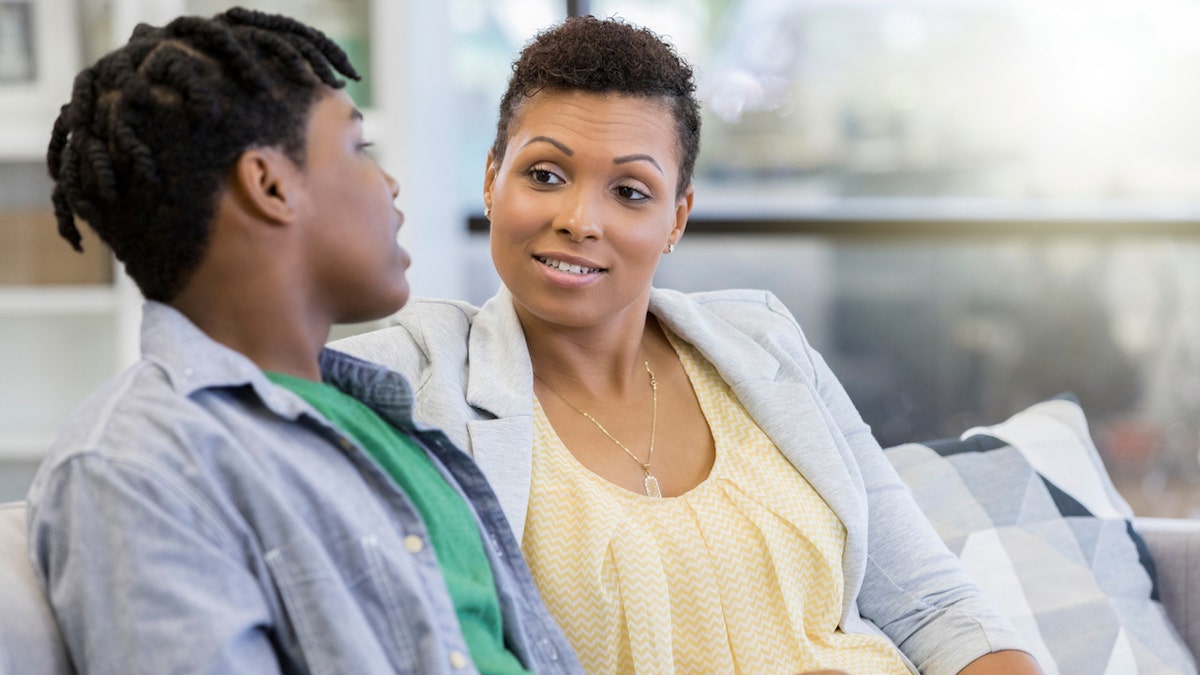 Parent talking to teen