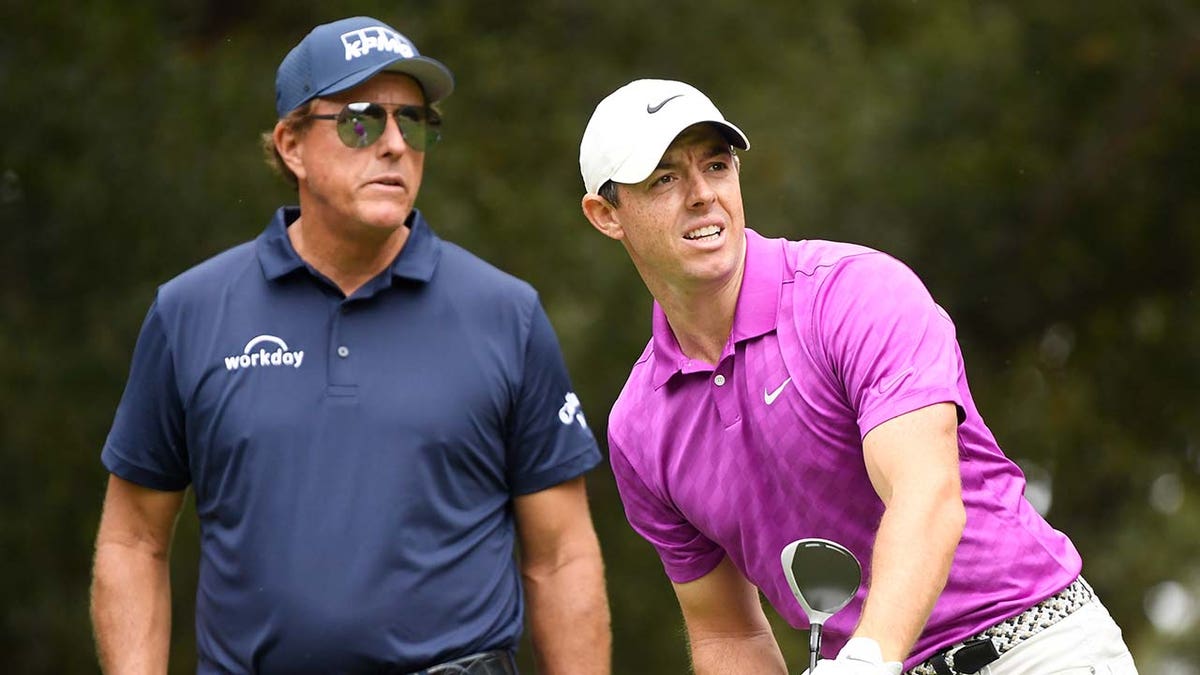 Phil Mickelson and Rory McIlroy at tee box