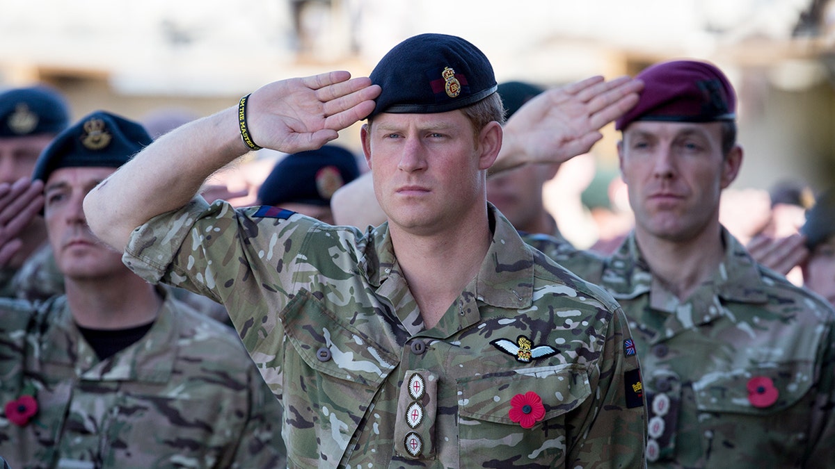 Prince Harry saluting in uniform