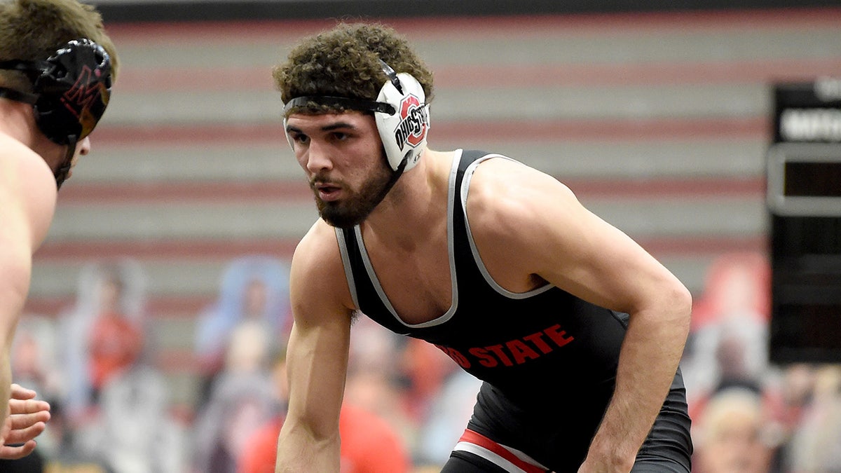 Sammy Sasso of the Ohio State Buckeyes wrestles against Hunter Baxter of the Maryland Terrapins