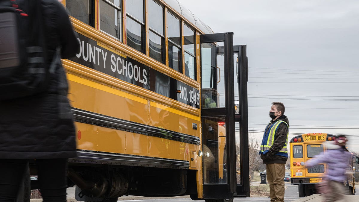 kids outside school bus