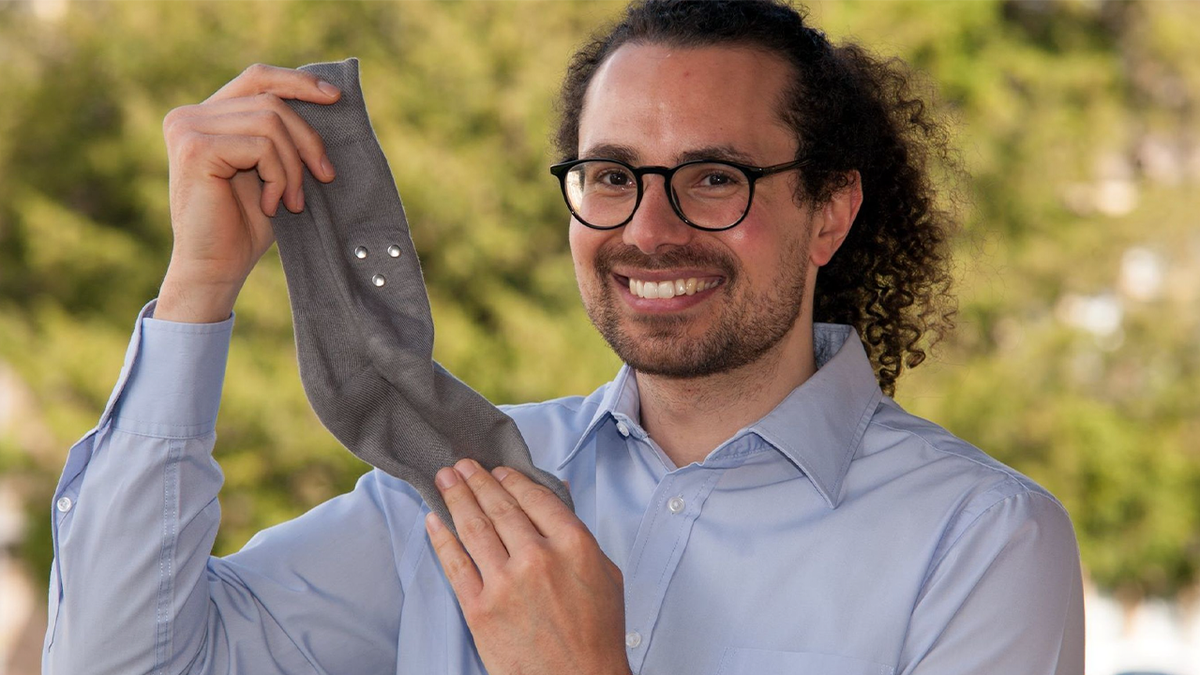 SmartSocks exec holding up company product