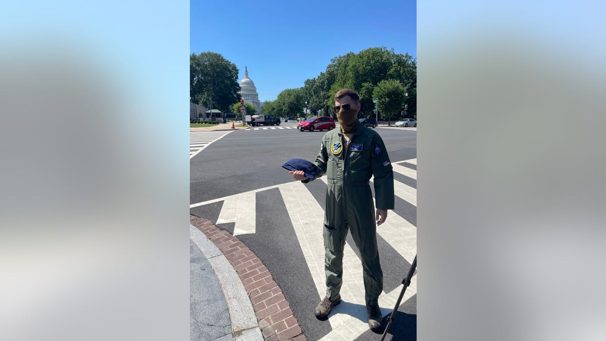 Andrii Pilshchykov with Capitol in background