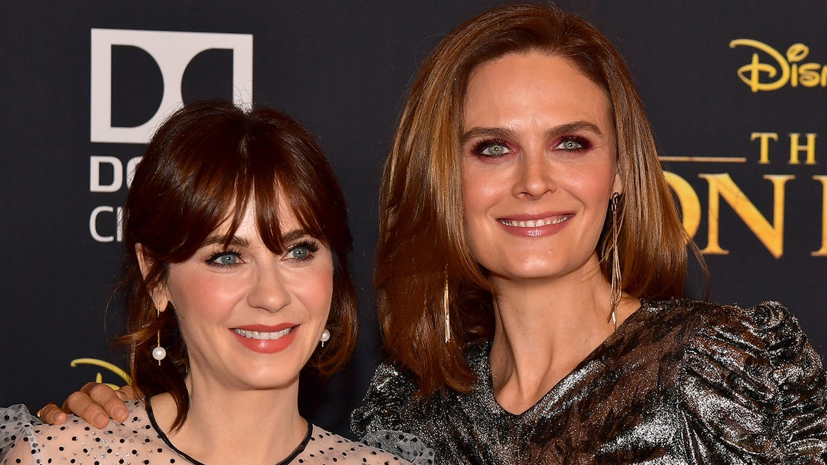 Zooey and Emily Deschanel at the premiere of "The Lion King"