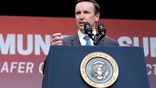 FILE - Sen. Chris Murphy, D-Conn., speaks at the National Safer Communities Summit at the University of Hartford in West Hartford, Conn., Friday, June 16, 2023. Murphy says on Wednesday, Aug. 30, he's reluctantly postponing his annual “Walk Across Connecticut” after testing positive for COVID. The 50-year-old Democrat has been donning his shorts and T-shirt and walking across much of the state since 2016. (AP Photo/Susan Walsh, File)