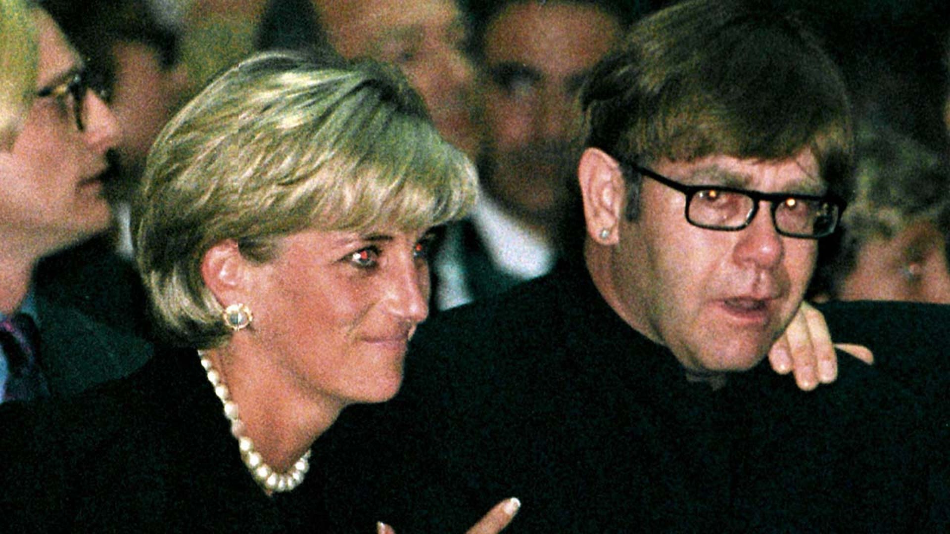 Princess Diana and pop star Elton John attend a memorial