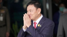 Thailand's king reduces prison sentence of former Prime Minister Thaksin Shinawatra to a single year