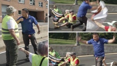 Man lunges at climate activists blocking road on his way to work: 'You motherf---er''