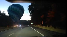 Hot air balloon lands on Vermont highway median after mid-flight stall: 'Uncommon and unplanned location'