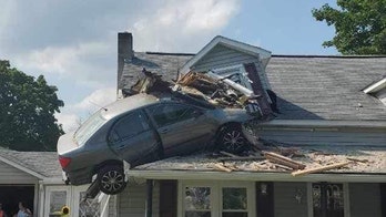 Pennsylvania driver hospitalized after bizarrely crashing car into second floor of home