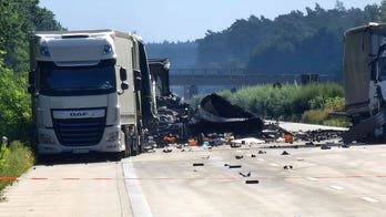 2 killed in Germany after multi-truck highway crash releases hazardous materials