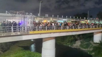 Migrants disrupt commercial operations at Texas border port