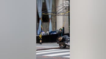 Asylum seekers sleep on New York City sidewalk with Manhattan's Roosevelt Hotel at full capacity