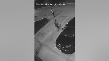 Texas motel surveillance video shows moment man riddles car of girlfriend's ex with a dozen bullets: police