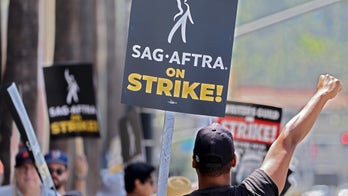 Background actors fear being taken ‘advantage of’ by AI, as union and studio negotiations continue to stall