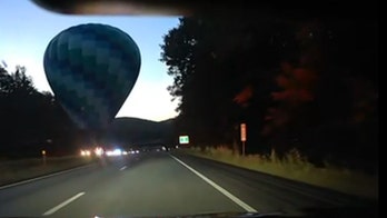 Hot air balloon lands on Vermont highway median after mid-flight stall: 'Uncommon and unplanned location'