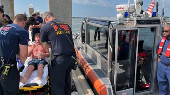 Florida man saved at sea by Coast Guard from partially submerged boat after 24-hour search and rescue effort