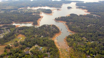 Georgia reservoir claims third life in past week as body of missing swimmer, 27, recovered in Lake Lanier
