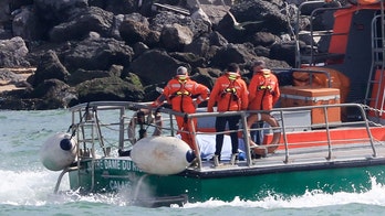 Migrant boat crossing Channel from France capsizes, at least six dead