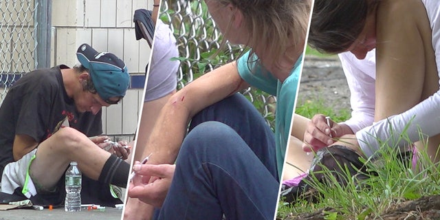 Drug users injecting themselves with needles