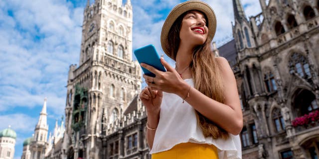 Woman traveling with her phone.