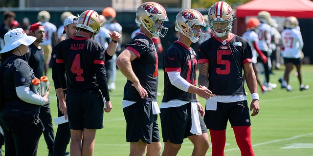 The 49ers QB's look on at practice