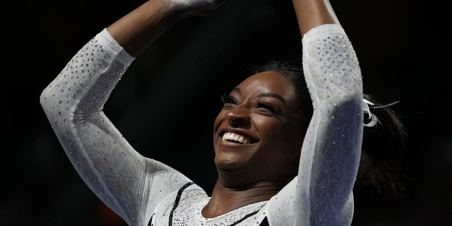 Simone Biles smiles after the win