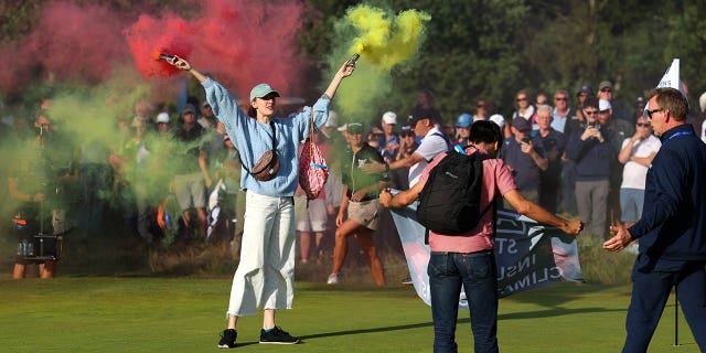 Protesters disrupt the final round of the AIG Women's Open