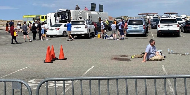 Emergency personnel tend to a crash