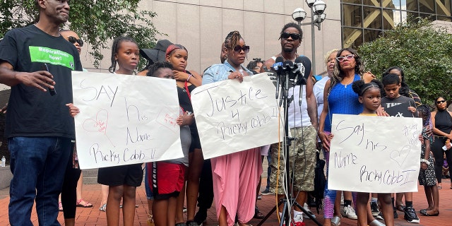 Family members of Ricky Cobb II,